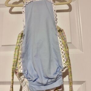 Blue 9M sunsuit with rainbow plaid straps and side ties